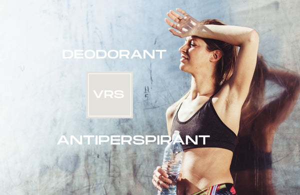 Women in gym gear leaning on concrete wall with arm over her head, heading Deodorant vrs Antiperspirant